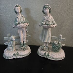 Elegant Porcelain Figurines with Green Accents